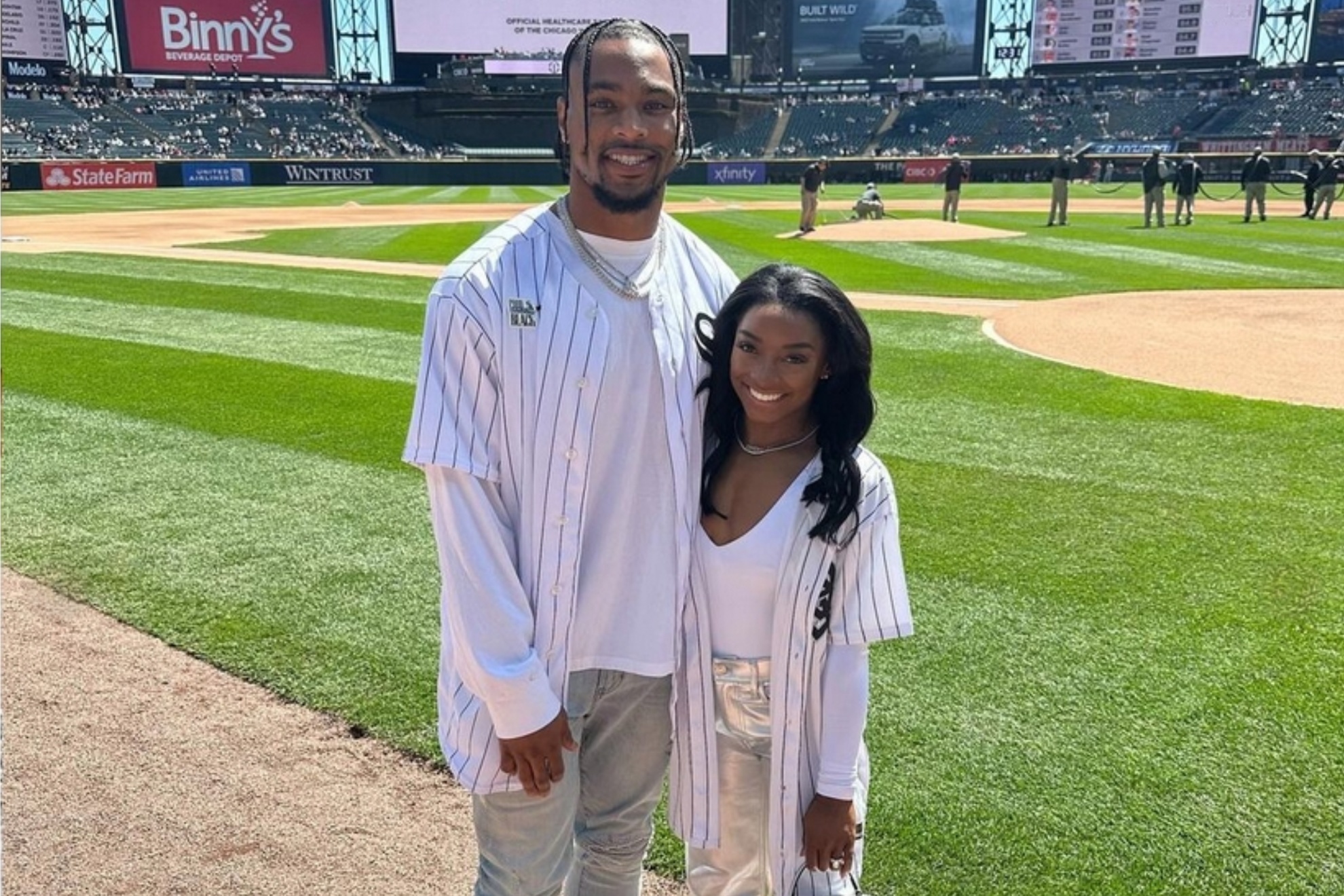 Jonathan Owens and Simone Biles at the Guaranteed Rate Field for the White Soxs game.