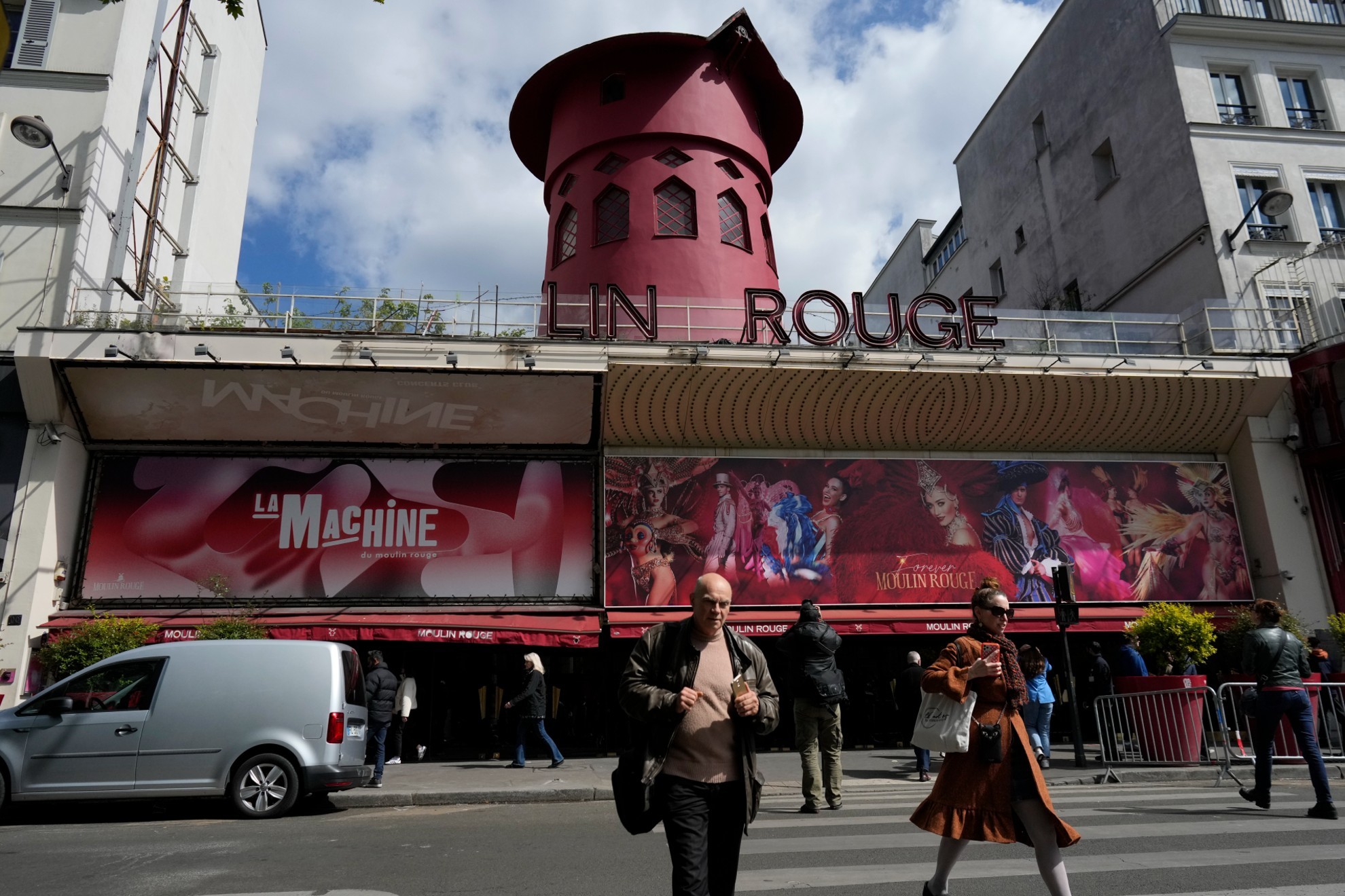 The windmill sails at Paris iconic Moulin Rouge have collapsed but no injuries are reported