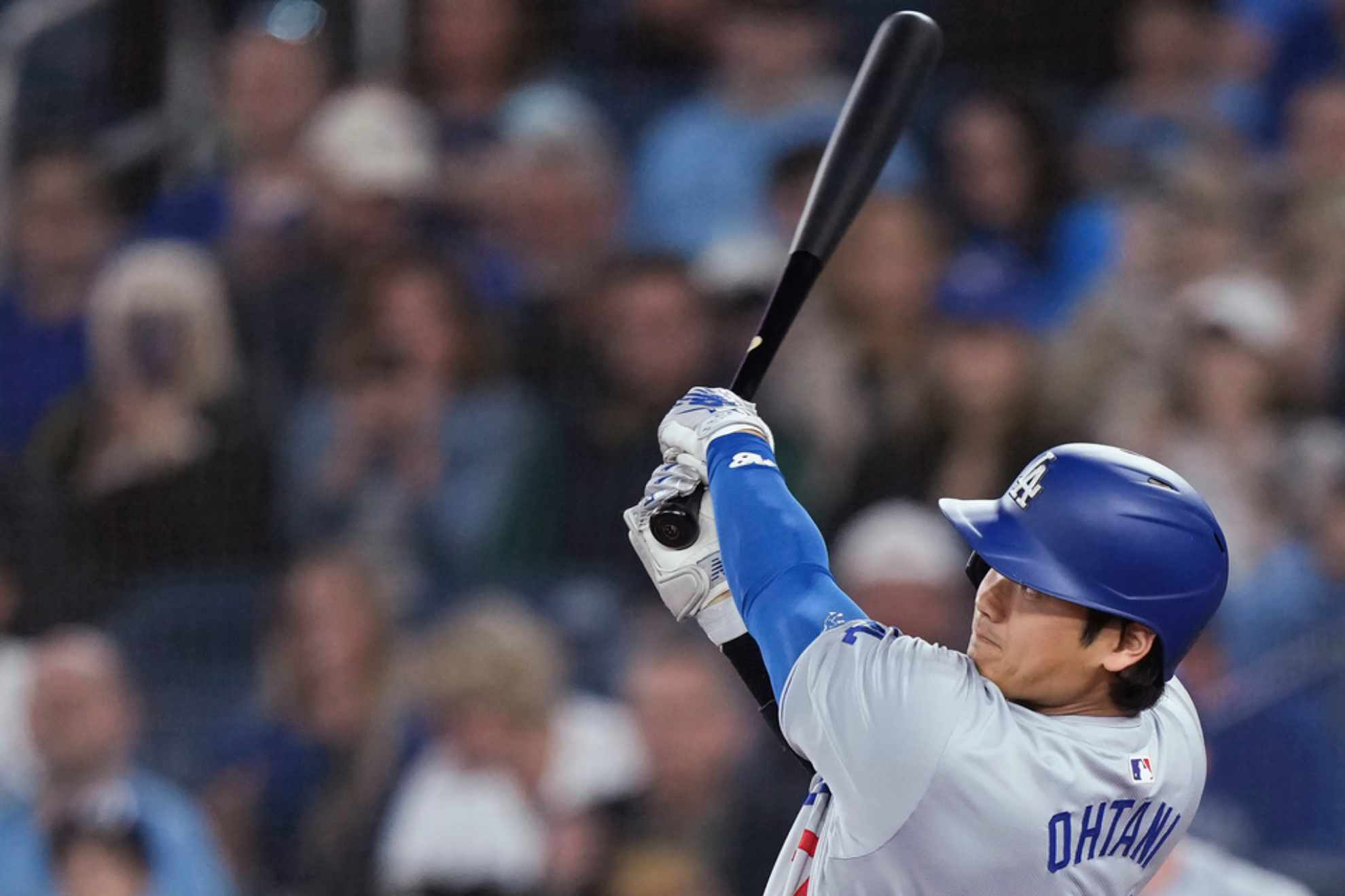 Los Angeles Dodgers designated hitter Shohei Ohtani watches his solo home run against the Toronto Blue Jays /