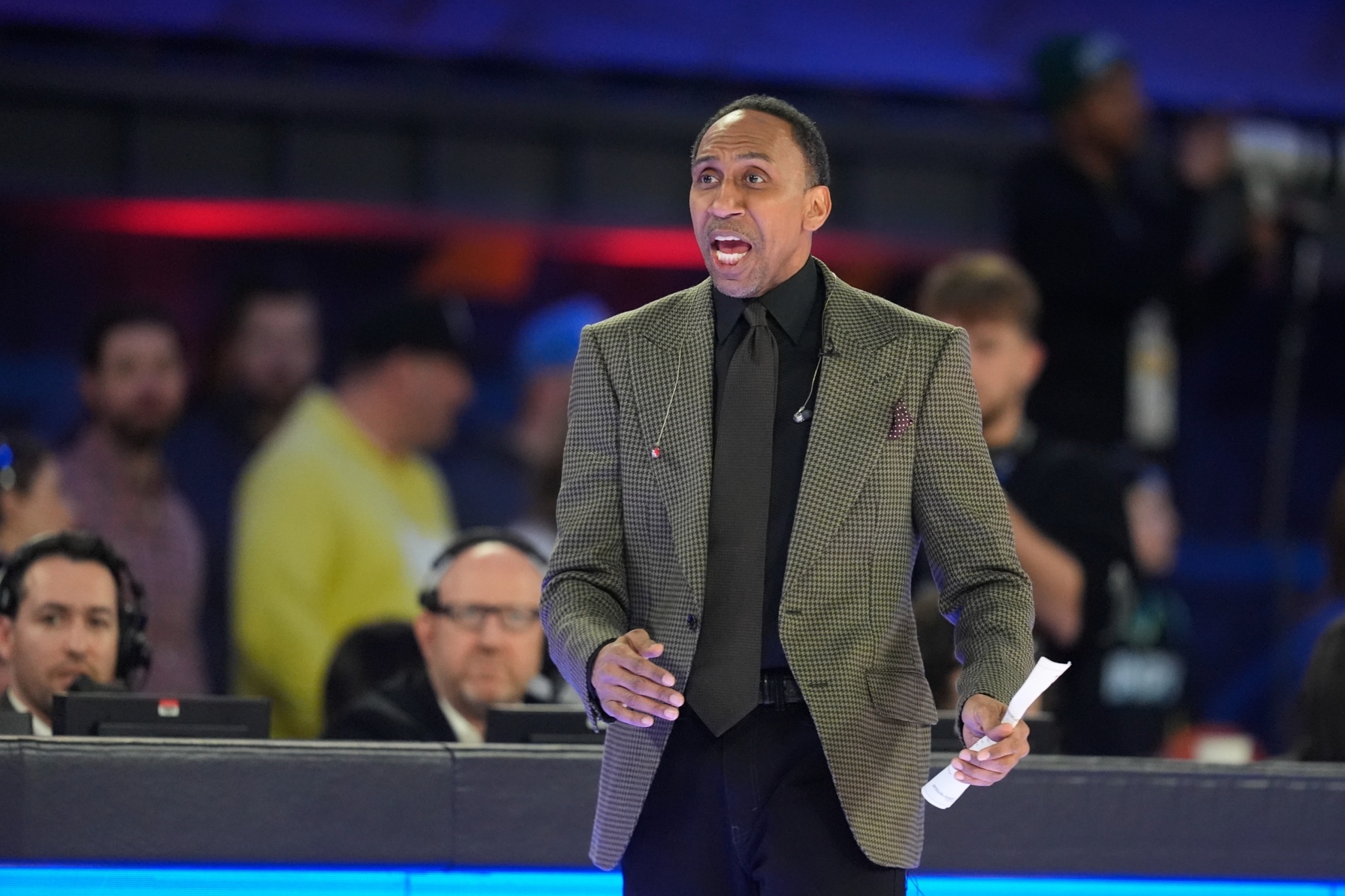 Stephen A. Smith shouts during the first half of the NBA All-Star Celebrity Game, Friday, Feb. 16, 2024, in Indianapolis. (AP Photo/Darron Cummings)