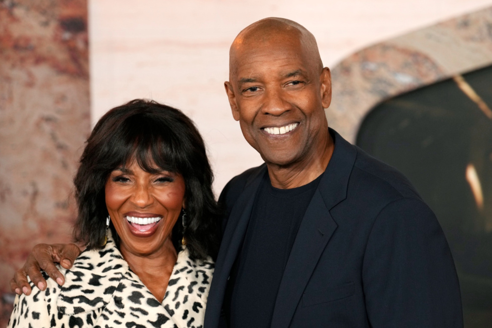 Denzel Washington was accompanied by his wife Pauletta during his baptism.