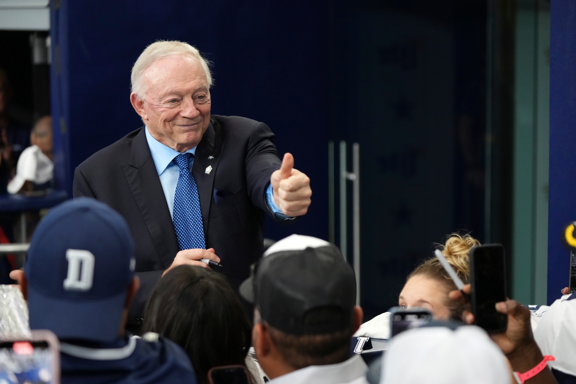 Dallas Cowboys team owner Jerry Jones interacts with fans before an NFL football game against the Philadelphia Eagles in Arlington, Texas, Sunday, Nov. 10, 2024.
