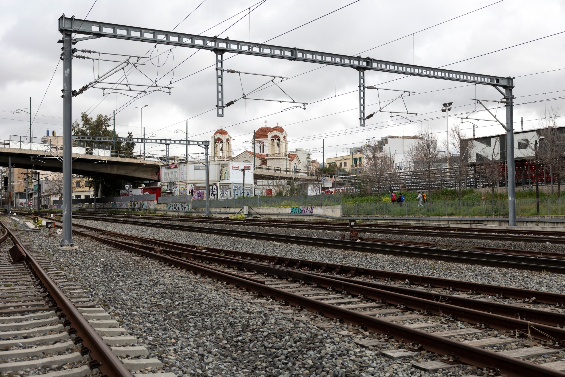 Car occupants escape seconds before train hits vehicle stuck on tracks