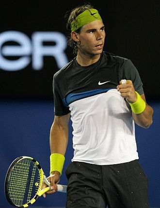 Rafa Nadal celebra un punto en su choque de primera ronda del Open de Australia 2009 ante Christophe Rochus.