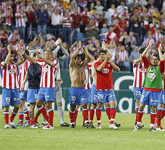La plantilla del Atlético celebró la consecución del objetivo.