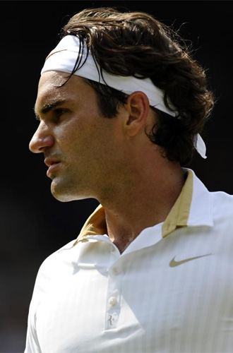 Federer, en el partido ante Philipp Kohlschreiber en Wimbledon.