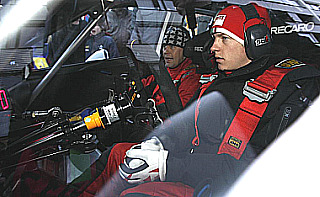 Kimi, durante una de sus escapadas a los rallys.