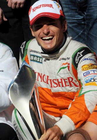 Fisichella celebra el segundo puesto lgorado en Spa.