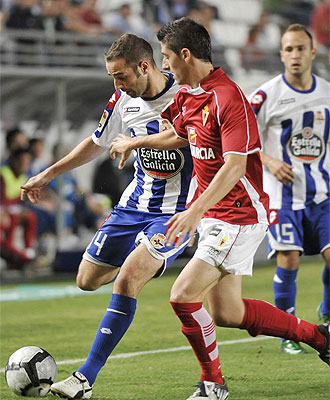 Lance del encuentro de ida entre el Deportivo y el Murcia