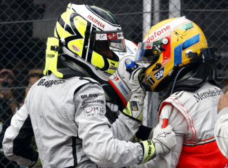 Button y Hamilton, en una carrera de esta temporada.
