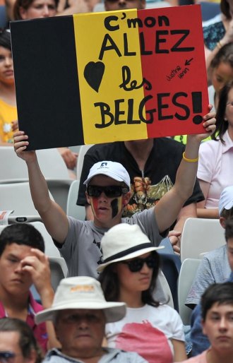 Pancarta animando a la colonia belga en Melbourne Park.