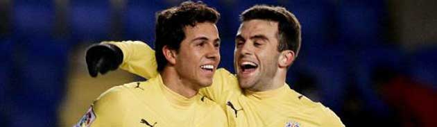 Rossi y Nilmar celebrando un gol con el Villarreal