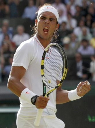 Rafa Nadal celebra un punto ante Andy Murray.