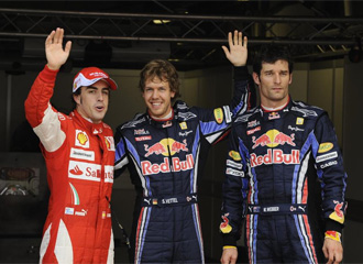 Alonso, Vettel y Webber posan tras los entrenamientos en Silverstone