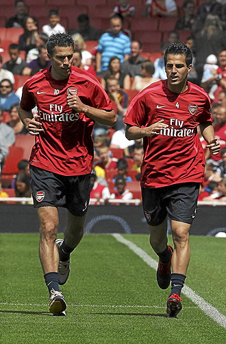 Van Persie y Fbregas, en un entrenamiento del Arsenal.