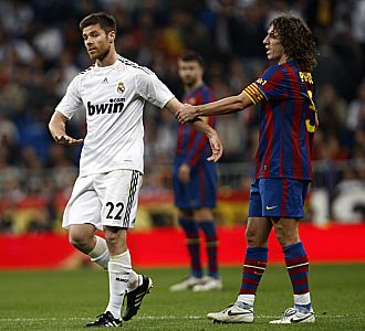 Xabi Alonso y Puyol, en el ltimo clsico Barcelona-Real Madrid