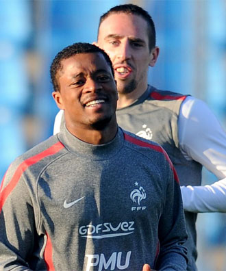 Patrice Evra y Franck Ribery, en un entrenamiento.