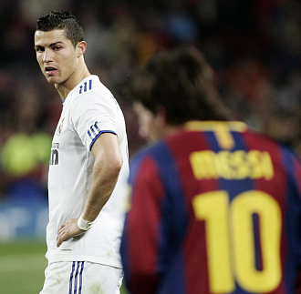 Cristiano y Messi, durante el partido de Liga disputado en el Camp Nou.