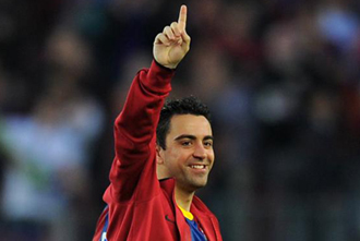 Xavi festeja el triunfo contra el Espanyol