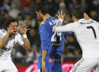 Marcelo y Cristiano celebran un gol en el partido de la primera vuelta