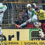Lewandoswski y Reus sacan el orgullo del Dortmund