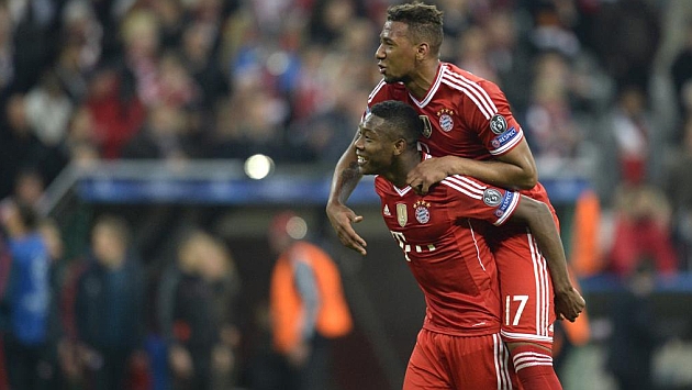 Alaba y Boateng celebran un triunfo del Bayern esta temporada en Champions. / AFP