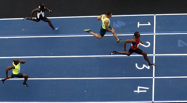 Usain Bolt alcanza la meta en primera posicin. Foto: RTRPIX