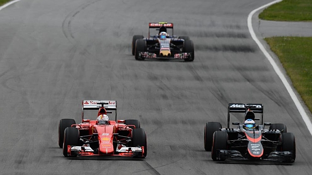 Vettel intenta adelantar a Alonso, en el pasado G.P. de Canad / RV Racing Press