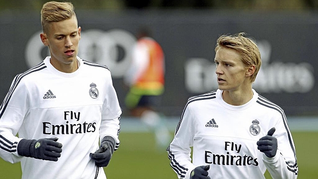 Marcos Llorente (20) y Martin Odegaard (16), en un entrenamiento durante la gira australiana del Real Madrid.