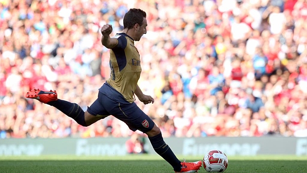 Santi Cazorla en un partido con el Arsenal