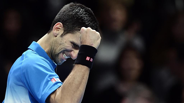 Novak Djokovic celebra su victoria ante Rafa Nadal en la Copa Masters de Londres.