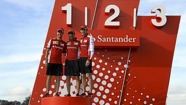 Vettel, junto a Gen y Gutirrez ayer en la sede del Santander en Madrid. /Fotos RV Racingpress