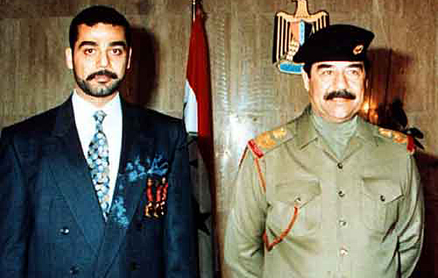 Uday Hussein, al lado de su padre Sadam Hussein.